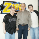 Men gathered together with Bob at Z100 studio