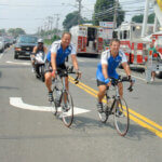 men riding bicycles