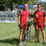two men in cycling uniform