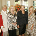 Women gathered together inside home