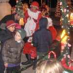 Parents and children gathered inside a Christmas event