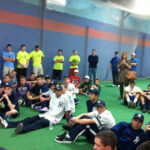 baseball players gathered togehter in gym